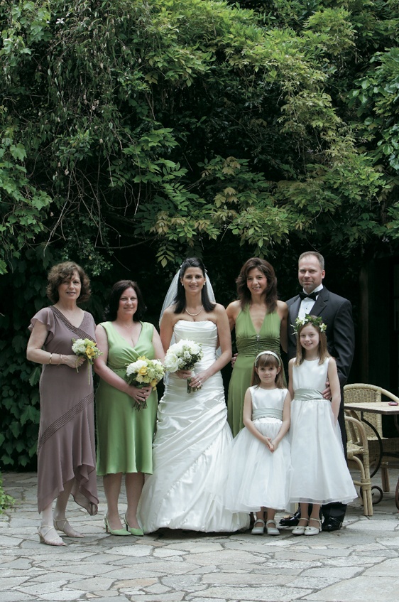 Bride and Groom With Loved Ones
Photography: Sherman Chu Photographer
Read More:
http://www.insideweddings.com/weddings/elegant-garden-style-vineyard-wedding-in-sonoma-california/205/ Bride in a Pnina Tornai gown and groom in a black tuxedo with bridal party members