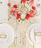 Tropical Place Setting
Photography: Steve Steinhardt
Read More:
http://www.insideweddings.com/weddings/tropical-romantic-destination-wedding-in-hawaii/397/ White coral and pink florals with seagrass bands