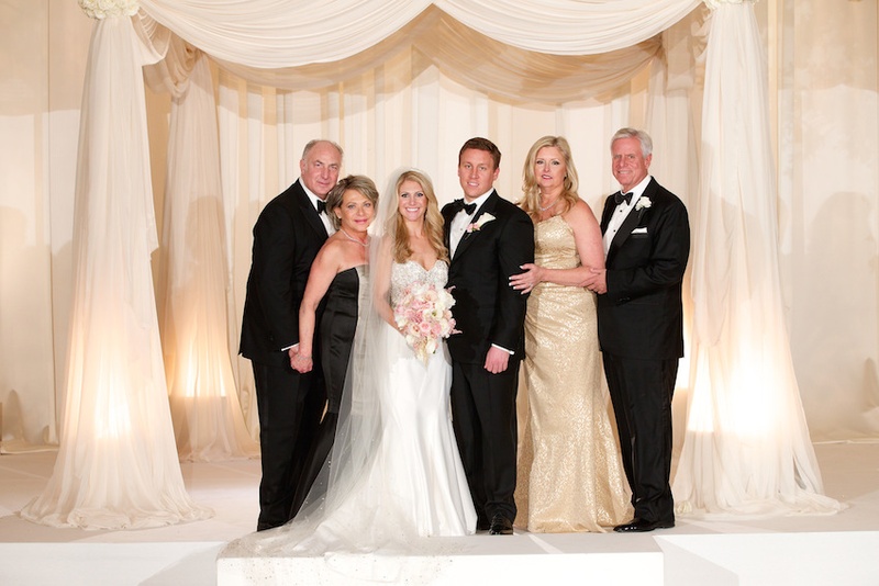 Newlyweds' Parents Under Chuppah
Photography: Bob %26 Dawn Davis Photography
Read More:
http://www.insideweddings.com/weddings/glamorous-ivory-blush-spring-wedding-at-a-private-club-in-chicago/685/ Bride and groom with mother of bride and father of bride