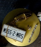 License Plate Bridal Clutch
Photography: Kesha Lambert Photography
Read More:
http://www.insideweddings.com/weddings/elegant-white-gold-country-club-wedding-in-north-carolina/1282/ wedding accessories for bride fragrance diamond bracelet earrings las vegas miss to mrs clutch bag