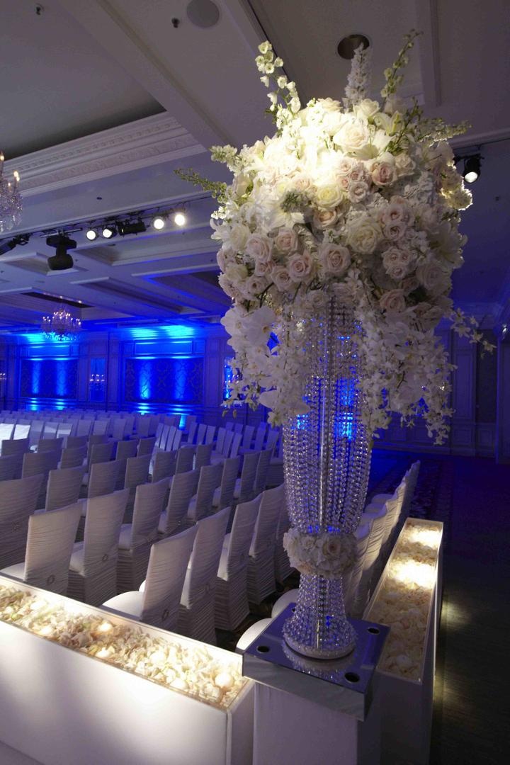 Crystal Ceremony Arrangement
Photography: KingenSmith
Read More:
http://www.insideweddings.com/weddings/timeless-black-white-wedding-in-chicago-illinois/349/ White rose and flower arrangement at Chicago wedding