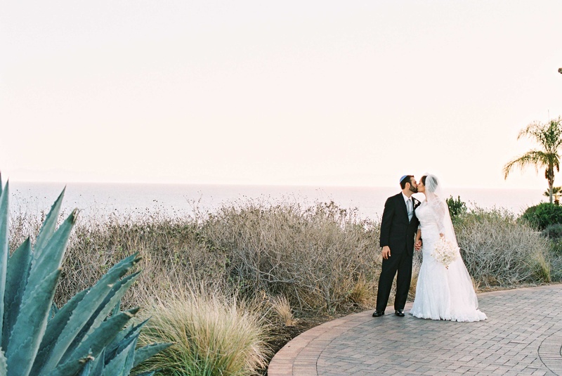 Jewish Couple at Seaside Venue
Photography: Braedon Photography
Read More:
http://www.insideweddings.com/weddings/orthodox-jewish-wedding-with-outdoor-ceremony-inspired-by-the-sea/812/ Bride in Alfred Angelo wedding dress groom in tuxedo at Terranea wedding venue in California