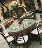 Neutral-Toned Tablescape
Photography: Sean Randall Photography
Read More:
http://www.insideweddings.com/weddings/producer-david-brauns-wedding-at-natural-history-museum-in-atlanta/198/ Brown linens and white calla lily centerpiece