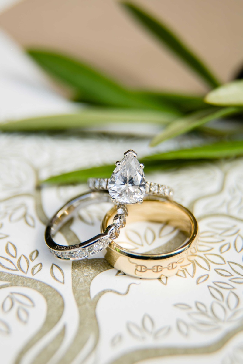 Teardrop-Shaped Diamond Ring
Photography: Samuel Lippke Studios
Read More:
http://www.insideweddings.com/weddings/a-rustic-camp-themed-outdoor-wedding/908/ Pear shape teardrop shape wedding ring with pave diamond band and unique wedding ring gold men's ban