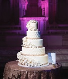 Sugar Flowers %26 Moroccan Lace Cake
Photography: Callaway Gable
Read More:
http://www.insideweddings.com/weddings/modern-in-the-round-ceremony-whimsical-garden-inspired-reception/1155/ Wedding cake five layer fondant confection sugar flowers wrapping around each layer moroccan lace