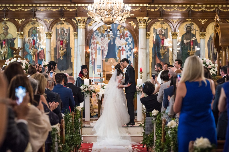 Greek Orthodox Ceremony at Cathedral
Photography: Kent Drake Photography
Read More:
http://www.insideweddings.com/weddings/greek-orthodox-ceremony-romantic-ballroom-reception-in-chicago/1334/ wedding ceremony greek orthodox cathedral gold foil chandelier greenery church pews