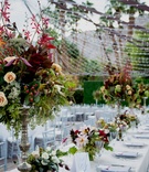 Fall-Hued Centerpiece at Outdoor Wedding
Photography: Figge Photography
Read More:
http://www.insideweddings.com/weddings/fall-outdoor-wedding-at-a-luxury-resort-in-the-california-desert/1063/ Fall wedding in La Quinta Palm Springs area white linens string lights tent formation fall colors