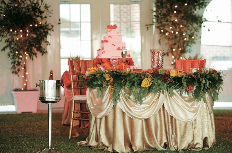 Fall-Themed Sweetheart Table
Photography: Mark Staff Photography
Read More:
http://www.insideweddings.com/weddings/autumn-inspired-golf-club-wedding-in-south-carolina/149/ Gold linen covered couple's table with greenery and fall leaves