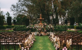 Fountain at Altar for Outdoor Ceremony
Photography: Aesthetiica Photography
Read More:
http://www.insideweddings.com/weddings/modern-fall-wedding-with-courtyard-ceremony-rooftop-reception/1069/ Stephanie Perez and Brandon Hampton wedding ceremony outdoor at greystone mansion flowers foliage
