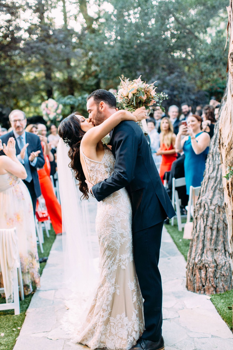 Kiss at the End of the Aisle
Photography: Ashley Paige Photography
Read More:
http://www.insideweddings.com/weddings/elegant-outdoor-fall-wedding-at-a-rustic-chic-venue-in-malibu/1244/ wedding ceremony outdoor bride groom kiss at end of aisle after ceremony