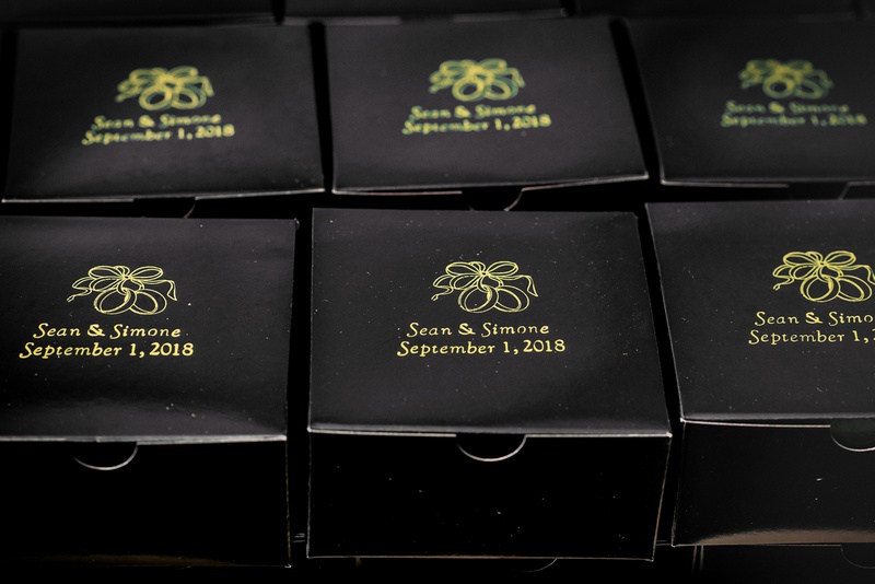 Custom Favor Boxes
Photography: Kesha Lambert Photography
Read More:
http://www.insideweddings.com/weddings/sweet-simple-alfresco-wedding-with-gold-details-in-the-poconos/1242/ custom wedding favor boxes in black with gold printed name and wedding date
