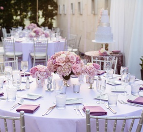 Pastel Purple Tablescape
Photography: Full Spectrum Photography
Read More:
http://www.insideweddings.com/weddings/a-modern-san-diego-hotel-wedding-with-purple-sparkling-details/672/ Rooftop wedding reception tables with purple linens, roses, silver chairs