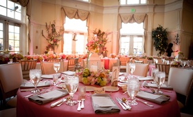 Wine-Themed Table Details
Photography: Shanti DuPrez Portrait Design
Read More:
http://www.insideweddings.com/weddings/a-wine-country-inspired-country-club-wedding-in-san-mateo-ca/615/ Wedding reception table with pink tablecloth lantern centerpiece with green hydrangeas and pink rose