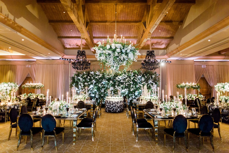 Charlise %26 George Springer's Reception Space
Photography: Brett Hickman Photographers
Read More:
http://www.insideweddings.com/weddings/charlise-castro-and-george-springer-iii/1165/ george springer astros wedding ballroom black gold chairs flower wall and flower chandelier