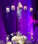 Ghost Candelabrum
Photography: Bob %26 Dawn Davis Photography
Read More:
http://www.insideweddings.com/weddings/spring-wedding-in-chicago-with-purple-lighting/381/ Purple lighting on clear candelabra centerpiece