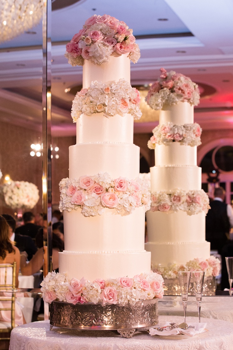 Five-Layer Cake Reflected in Mirror
Photography: Duke Photography
Read More:
http://www.insideweddings.com/weddings/jewish-ceremony-classic-ballroom-reception-in-beverly-hills/922/ five-tiered ivory wedding cake with blush roses