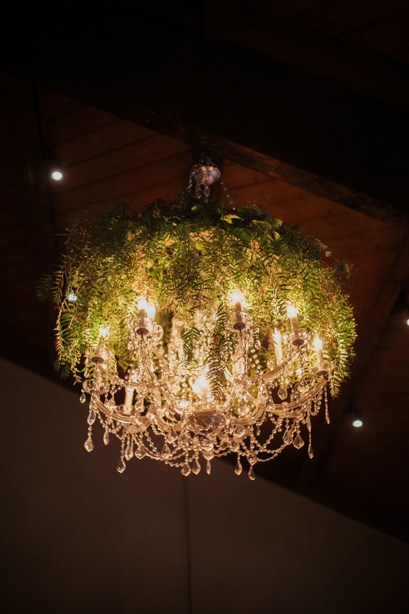 Chandelier Covered with Greenery
Photography: This Modern Romance
Read More:
http://www.insideweddings.com/weddings/rustic-chic-wedding-with-wooden-accents-and-verdant-details/861/ wedding decor crystal chandelier covered with greenery