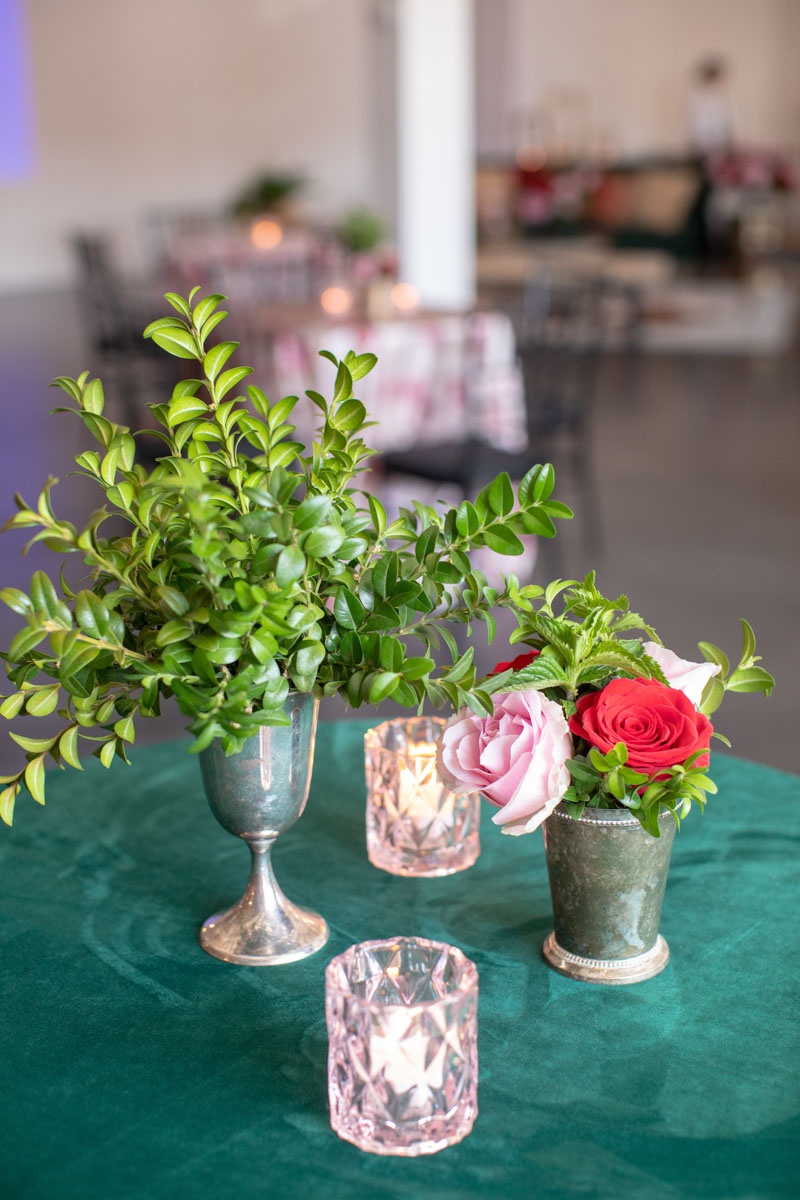 Pale Pink Votives
Photography: Collin Pierson Photography
Read More:
http://www.insideweddings.com/weddings/equestrian-themed-bridal-shower-inspired-by-the-kentucky-derby/1326/ emerald linen with tin goblet of boxwood, tin cup with flowers, pale pink votive