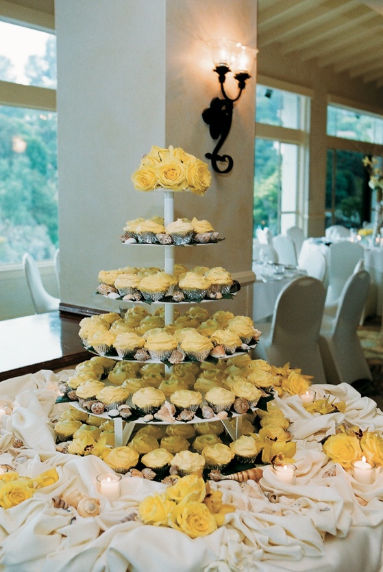 Tiered Cupcake Stand
Photography: frame.thirty.six photography
Read More:
http://www.insideweddings.com/weddings/tropical-inspired-spring-wedding-at-the-bel-air-bay-club/236/ Yellow cupcakes on tiers next to sea shells