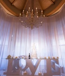 Table Legs Spelling "LOVE"
Photography: Duke Photography
Read More:
http://www.insideweddings.com/weddings/persian-american-wedding-with-mirror-detailing-in-newport-beach-ca/862/ table legs spelling LOVE at reception candles cake wine metallic