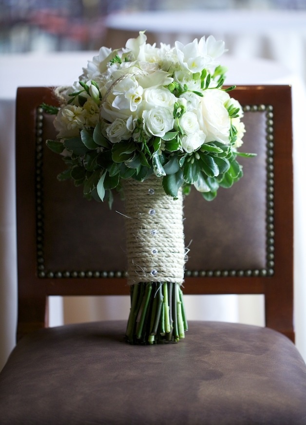 Rustic Bridal Bouquet
Photography: D. Park Photography
Read More:
http://www.insideweddings.com/weddings/rustic-spring-wedding-in-southern-california/454/ White rose bouquet with green leaves and twine