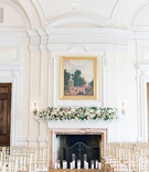 Fireplace with Candles %26 Floral Décor
Photography: Lauren Fair Photography
Read More:
http://www.insideweddings.com/weddings/elegant-wedding-with-muted-regal-decor-at-oheka-castle-in-new-york/1243/ wedding ceremony gold chairs altar fireplace fresh flowers sconces artwork oheka castle wedding