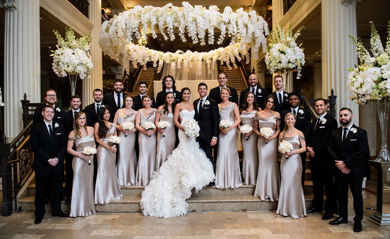 Large Wedding Party for Houston Ceremony
Photography: Chris Bailey Photography
Read More:
http://www.insideweddings.com/weddings/modern-elegant-ballroom-wedding-with-white-flowers-in-houston/1246/ wedding party bridesmaids in cowl neck bridesmaid dress