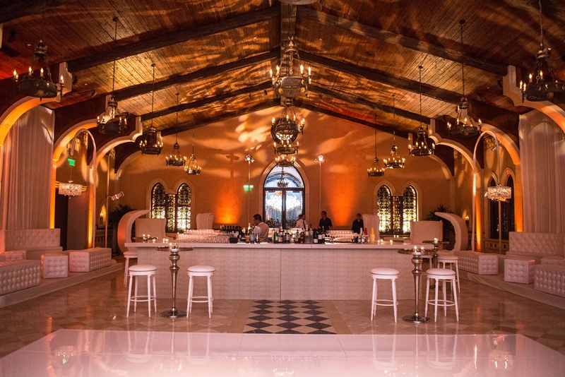 Nightclub-Themed After-Party
Photography: Triple Cord Photography
Read More:
http://www.insideweddings.com/weddings/destination-wedding-with-outdoor-reception-lavish-after-party/982/ Wedding after party with white decor white dance floor bar stools tufted ottoman bench furniture