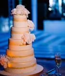 Rose Gold-Dusted Wedding Cake
Photography: Karlisch Photography
Read More:
http://www.insideweddings.com/weddings/destination-wedding-in-pink-church-on-harbour-island-in-the-bahamas/923/ Five layer wedding cake with gold details and sugar flower peony peonies flowers on tiers