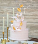 Blush Cake with Modern Décor
Photography: Collin Pierson Photography
Read More:
http://www.insideweddings.com/weddings/beach-wedding-ceremony-romantic-reception-inspiration-in-cabo/1304/ wedding cake on glass cake stand two layer round cake pink with sugar flowers branches gold taper