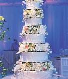 Flower and Lace Wedding Cake
Photography: Gruber Photographers
Read More:
http://www.insideweddings.com/weddings/lavender-hued-tented-reception-in-small-town-massachusetts/180/ Five layer wedding cake with flower tiers and lace details
