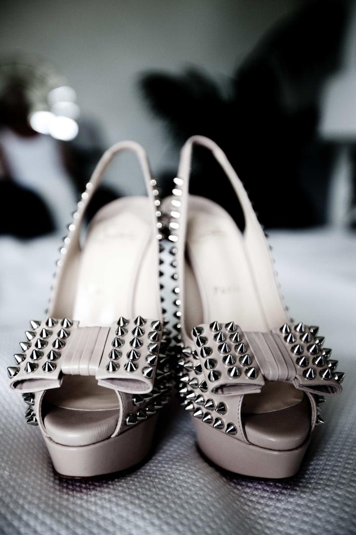 Studded Bridal Shoes
Photography: Lauren Ross Photography %26 Nancy Cohn Photography
Read More:
http://www.insideweddings.com/weddings/sophisticated-breakers-wedding-with-pink-florals/335/ Nude peep toe slingback with bows and studs