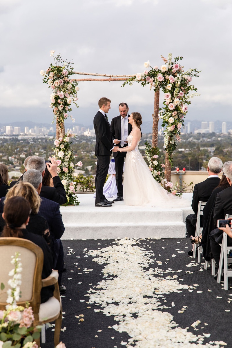 Bride %26 Groom Under Rustic Chuppah
Photography: Aevitas Weddings
Read More:
http://www.insideweddings.com/weddings/rooftop-ceremony-ballroom-reception-with-english-garden-theme/1286/ rooftop wedding ceremony los angeles city view rustic birch bark arch pink flowers greenery