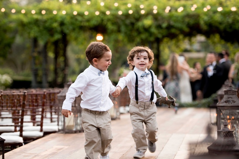 Two Ring Bearers Play Together Before The Ceremony Two Ring Bearers Play Together Before The Ceremony