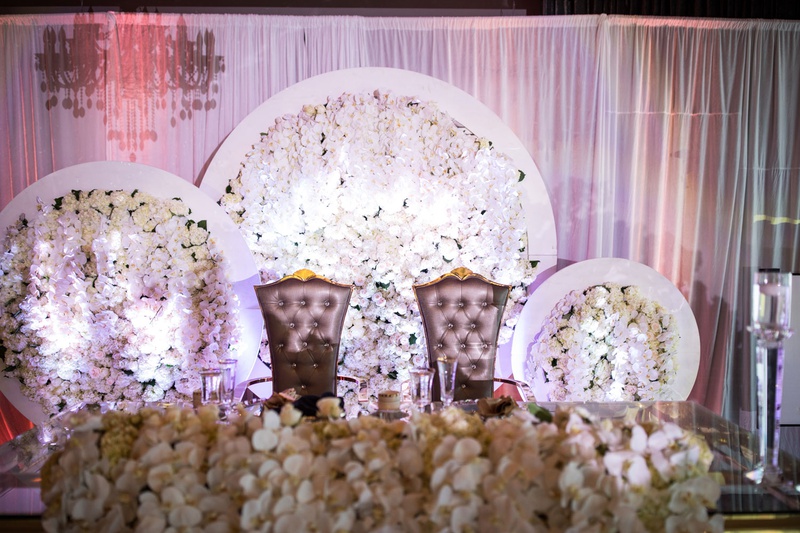 Luxurious Floral Sweetheart Table
Photography: Brian Bossany Photography
Read More:
http://www.insideweddings.com/weddings/luxurious-heaven-inspired-royal-wedding-celebration-in-minneapolis/1333/ wedding reception sweetheart table royal wedding gold flower arrangements orchids in white circles