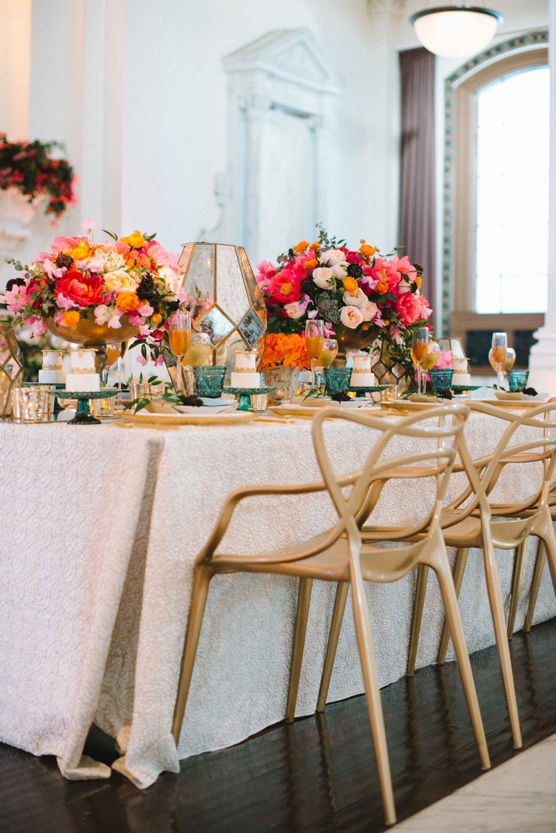 Long Tablescape, White Linen, Gold Chairs
Photography: Krista Mason Photography
Read More:
http://www.insideweddings.com/weddings/mediterranean-inspired-styled-shoot-featuring-unique-details/856/ long tablescape gold chairs white table linen colorful flowers
