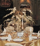 Golden Reception Décor
Photography: Cappy Hotchkiss Photography
Read More:
http://www.insideweddings.com/weddings/persian-chinese-wedding-celebration-in-new-york-city/130/ Yellow tablecloth topped with orchid tree
