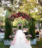 Archway of Greenery %26 Pink Blooms
Photography: Jay Lawrence Goldman Photography
Read More:
http://www.insideweddings.com/weddings/outdoor-ceremony-ballroom-reception-with-pink-flowers-greenery/1135/ Wedding ceremony outdoor wedding beverly hills hotel white aisle runner flower petals arch
