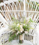 Bouquet with Pampas Grass
Photography: Fully Alive Photography
Read More:
http://www.insideweddings.com/weddings/roaring-twenties-garden-party-inspirational-wedding-shoot/1230/ ivory roses with greenery and bits of pampas grass