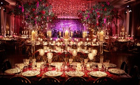 Winter Reception with Bold Décor
Photography: KingenSmith
Read More:
http://www.insideweddings.com/weddings/luxurious-wedding-featuring-sentimental-butterfly-decor-in-chicago/1348/ opulent luxury wedding reception trees purple neon sign red candlelight flowers greenery