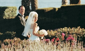 Bride and Groom in Garden
Photography: Isabel Lawrence Photographers
Read More:
http://www.insideweddings.com/weddings/romantic-seaside-wedding-at-the-biltmore-in-santa-barbara/76/ Newlyweds take a stroll with an ocean view
