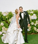 Portland Wedding Couple
Photography: Aaron Delesie Photographer
Read More:
http://www.insideweddings.com/weddings/elegant-all-white-country-club-wedding-with-natural-greenery/530/ Bride in pick-up ball gown skirt with tuxedo groom
