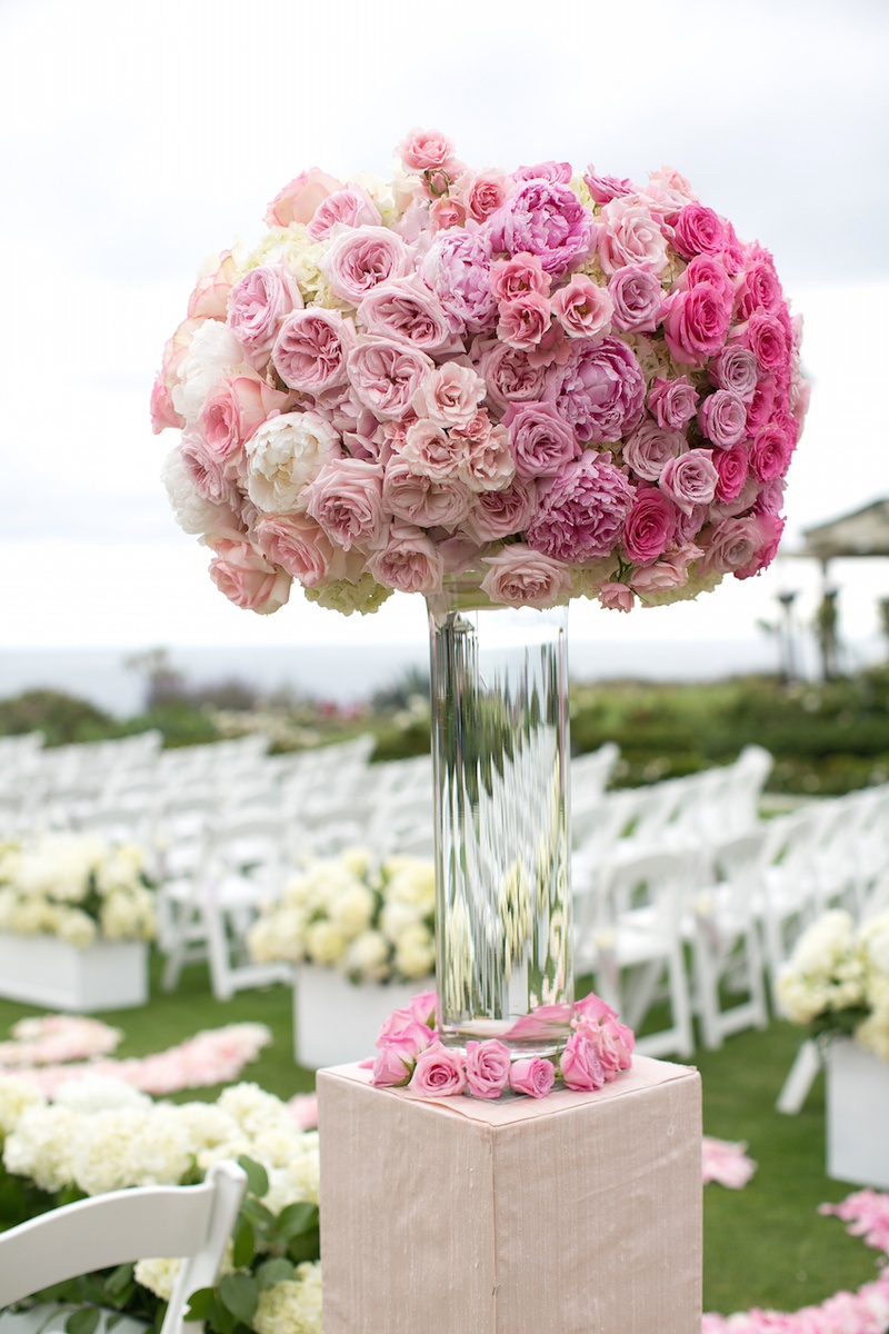 Pink %26 White Ceremony Arrangement
Photography: Marianne Lozano Photography
Read More:
http://www.insideweddings.com/weddings/pink-white-wedding-with-ombre-details-at-montage-laguna-beach/686/ Flower arrangement on riser with pink peonies, pink garden roses