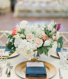 Gold Charger %26 Navy Blue Napkin
Photography: Lucas Rossi Photography
Read More:
http://www.insideweddings.com/weddings/traditional-catholic-ceremony-reception-at-a-california-racetrack/1139/ Wedding reception table gold charger plate navy blue napkin menu low flower arrangement hydrangea