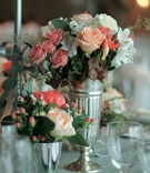 Peach Floral Centerpieces
Photography: Peter Thurin Photography
Read More:
http://www.insideweddings.com/weddings/traditional-italian-wedding-at-the-ritz-carlton-in-chicago/140/ Low centerpieces in silver vases with pink and white flowers