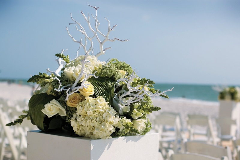 Green and Yellow Ceremony Flowers
Photography: Mermin + Christie Photographers
Read More:
http://www.insideweddings.com/weddings/tropical-theme-beach-wedding-in-naples-florida/184/ bouquet of green and yellow flowers with white branches in square white box