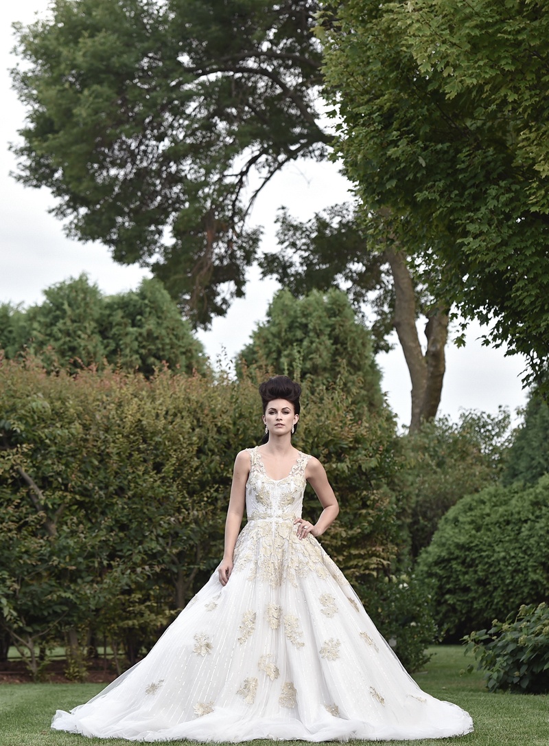 Regal Bride Strikes a Pose
Photography: Carasco Photography
Read More:
http://www.insideweddings.com/weddings/styled-shoot-combines-old-world-charm-and-contemporary-fashion/849/ bride in ines di santo julia, ball gown with gold appliques, marie antoinette hair
