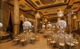 Golden Reception Space
Photography: Carasco Photography
Read More:
http://www.insideweddings.com/weddings/elegant-wedding-with-gold-champagne-color-palette-in-chicago/1124/ wedding reception in the drake hotel gold coast room with tall floral centerpieces