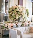 Lush Pink %26 Green Blooms on Mirror Table
Photography: Samuel Lippke Studios
Read More:
http://www.insideweddings.com/weddings/elegant-alfresco-ceremony-ballroom-reception-in-dallas-texas/930/ Flowers white and blush flowers on mirror table with candles and lounge furniture tufted sofa