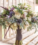 Neutral-Toned Rustic Bouquet
Photography: Sallee Photography
Read More:
http://www.insideweddings.com/weddings/rustic-chic-lakeside-wedding-with-geometric-details-in-california/843/ neutral tones rustic bouquet blue purple white green different kinds of flowers